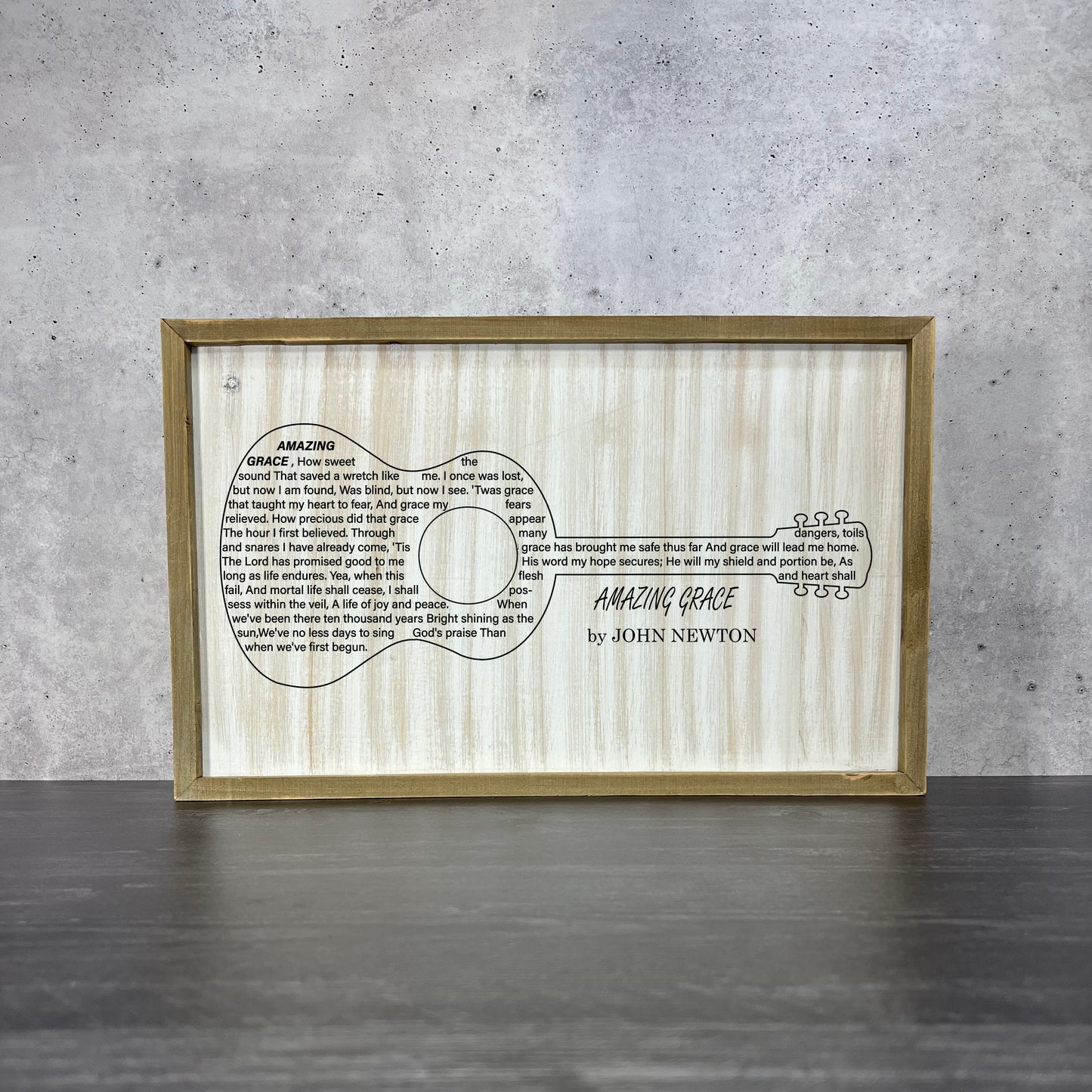 barnwood wall art featuring acoustic guitar and Amazing Grace lyrics