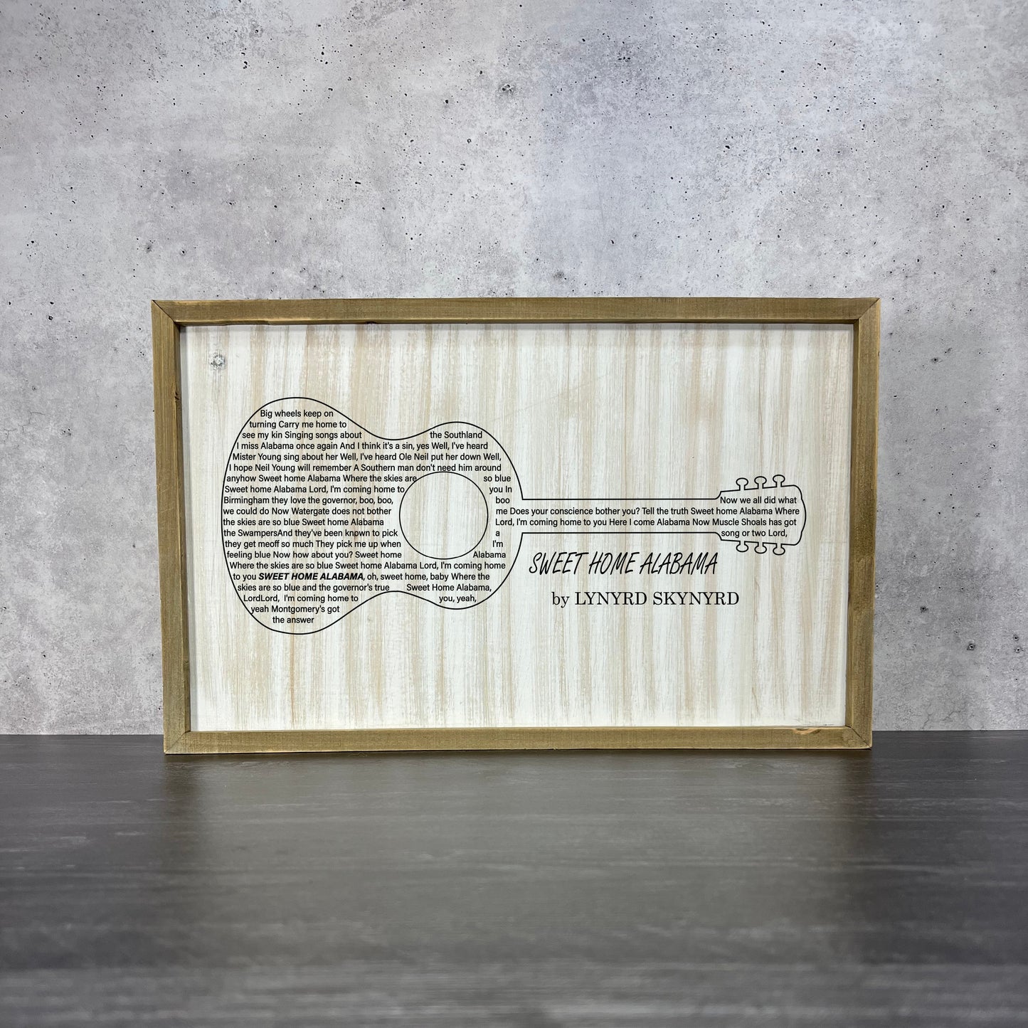 barnwood wall art featuring acoustic guitar and Sweet Home Alabama lyrics