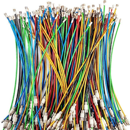 Collection of multicolored wires with connectors on a white background