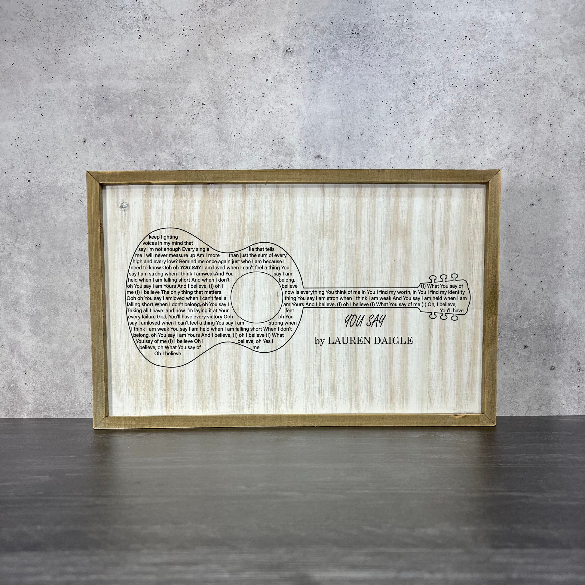 barnwood wall art featuring acoustic guitar and You Say lyrics