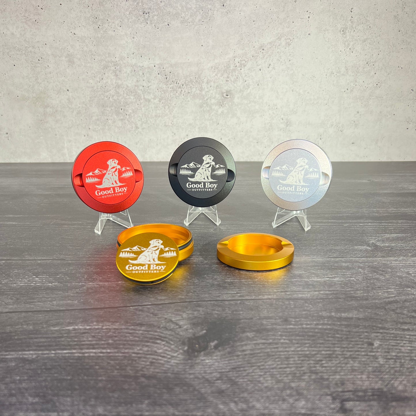Set of four round SNUS ZYN aluminum dip cans with different color options on a textured surface.