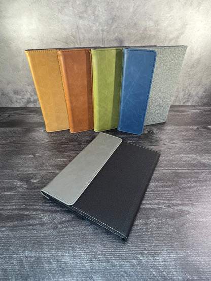 Padfolio style and color assortment on wood background