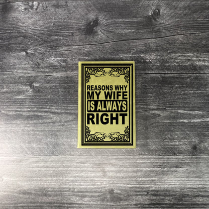 Olive colored leatherette journal on wooden background