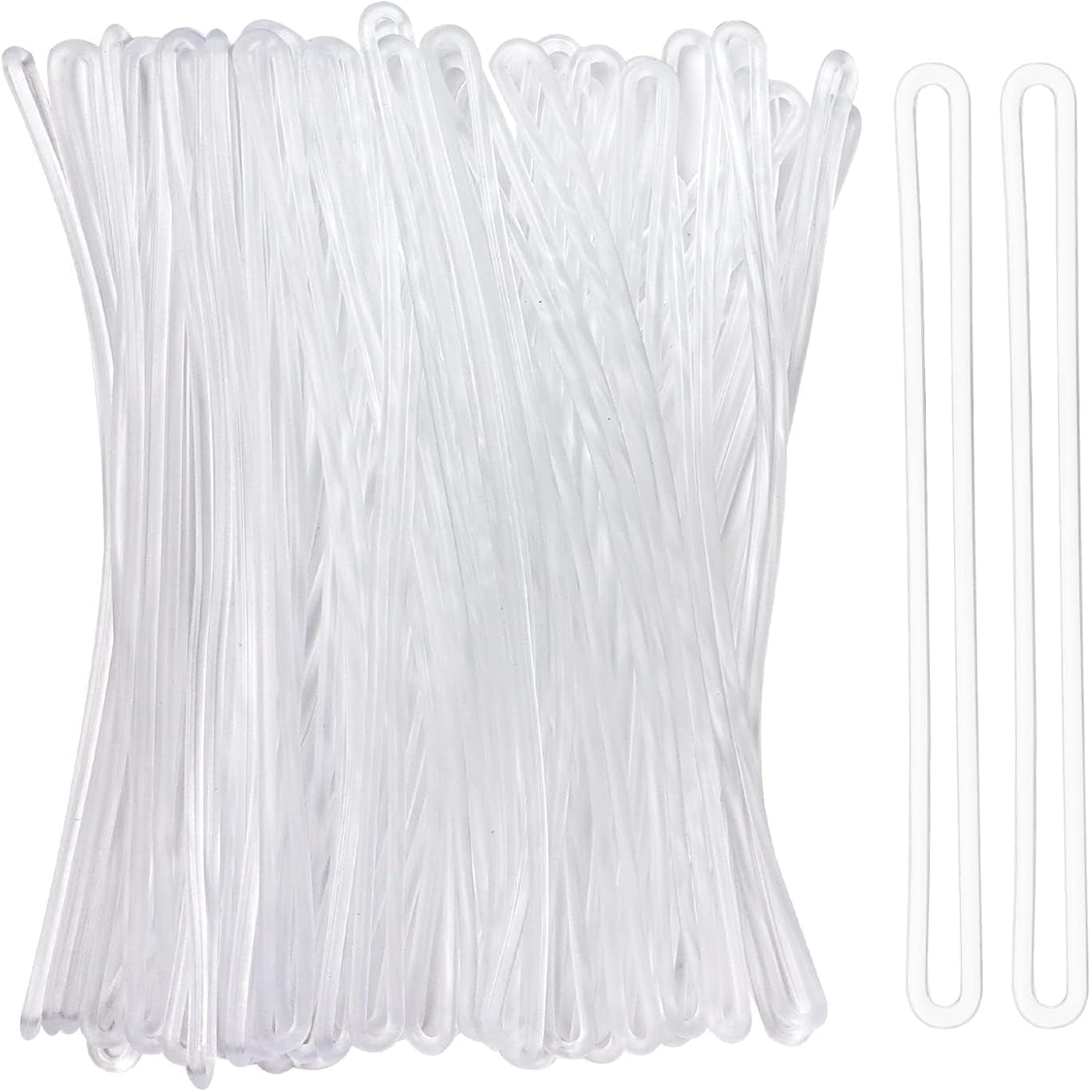 Clear plastic zip ties on a white background